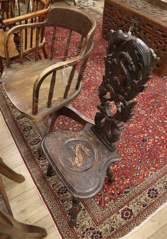 A Victorian carved oak spinning chair and a swivel desk chair (2)